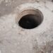 Vecinos denuncian la falta de la tapa en una boca de tormenta